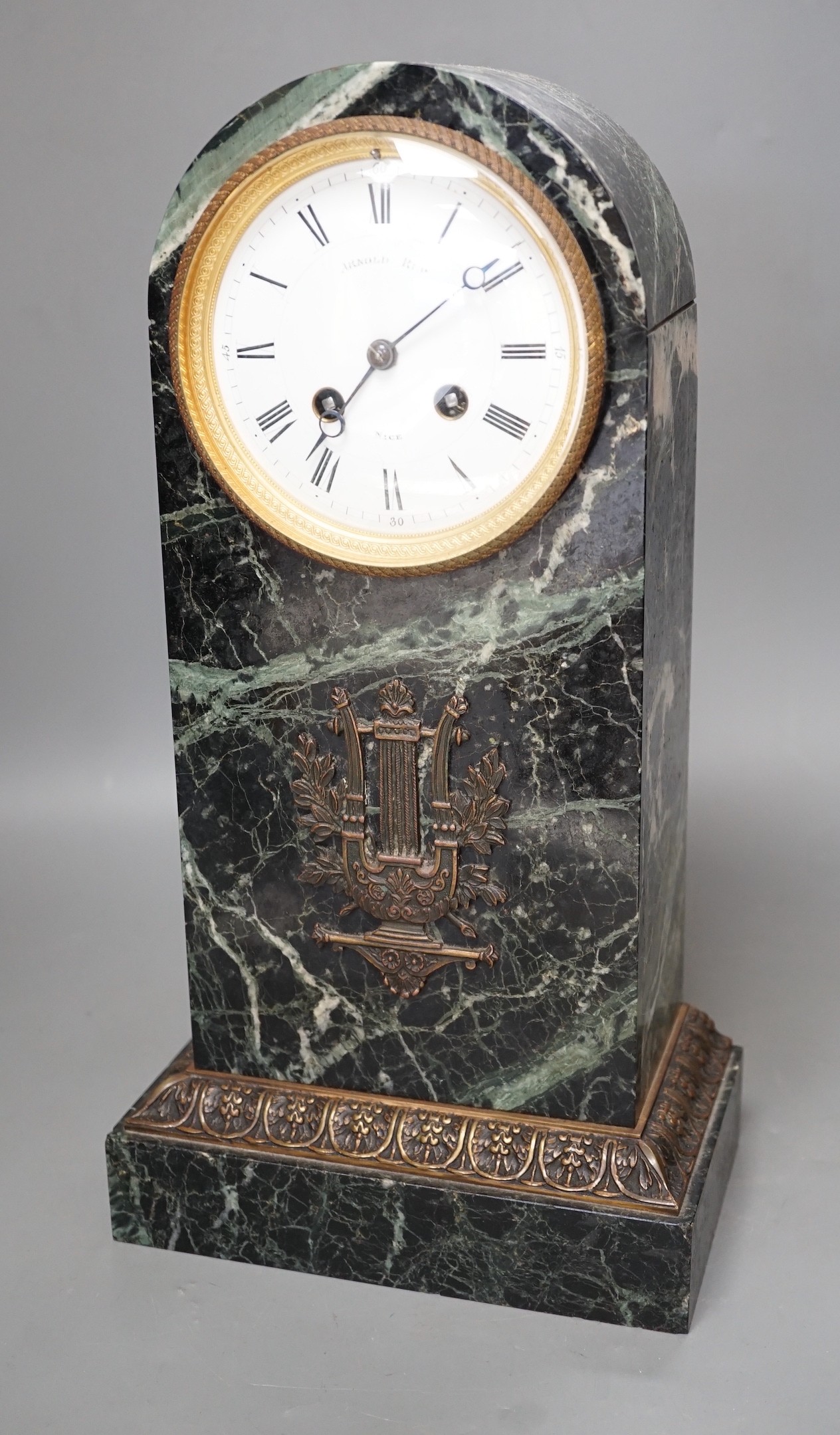 A 19th century French bronze mounted dome topped, green marble mantel clock, Height 39 cm